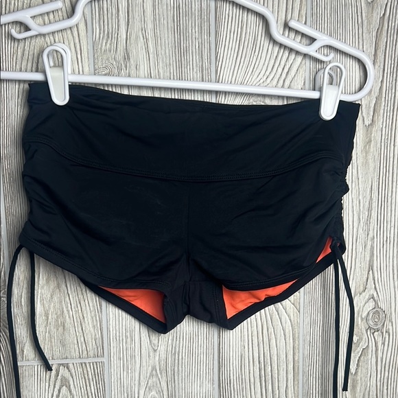 Athleta Black and Orange swim shorts size XS - Picture 1 of 4